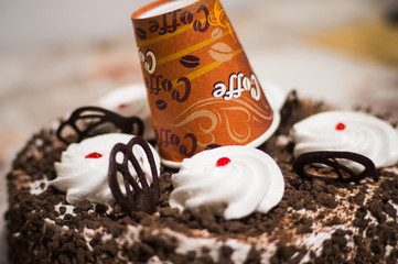 cake with paper coffee cup