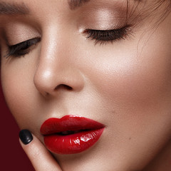 beautiful girl in Hollywood image with classic makeup and red lips. Beauty face. Photo taken in the studio.