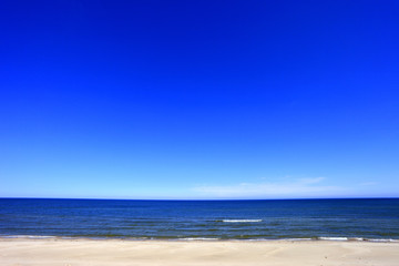 Fototapeta na wymiar Sand beach of Baltic Sea central shore near town of Rowy in Poland