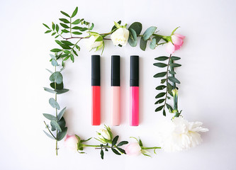 Lip gloss in the flower frame