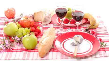 summer picnic with bread, wine and fruit
