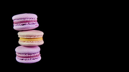 macaroons on a black background
