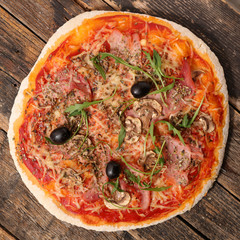 pizza on wood background