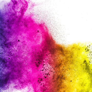 Multicolored powder explosion isolated on white background. Colored dust splash cloud  on white background. Launched colorful particles on background.