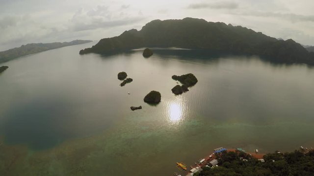 Aerial view of small islands Siete Pecados near in Coron Bay. Palawan. Overcast.