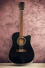 black acoustic guitar