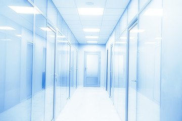 door glass plastic corridor, new office building, office rental, light blurred corridor background