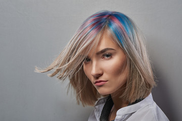 Portrait of young woman with trend dyed hair, professional hair coloring - obrazy, fototapety, plakaty