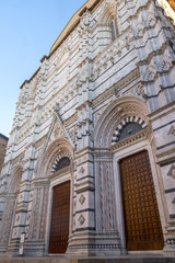 Fototapeta na wymiar Siena, Italy: historic buildings, the cathedral (Duomo)