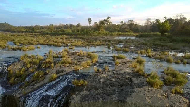 Zoom out of Dray Nur Waterfall and River Landscape