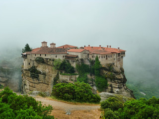 Fototapeta na wymiar Panorama of Meteora Monasteries in fog, Greece