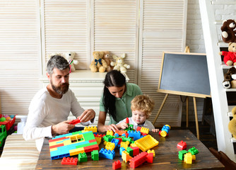 Happy family with child son playing together