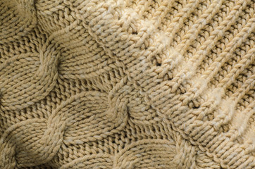 Beige Sweater Texture Close-Up. Elements of Knitted Sweater as Background