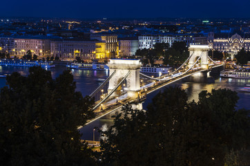 Fototapeta na wymiar Bridge over the river at night