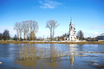 Fototapeta na wymiar Church on the river bank