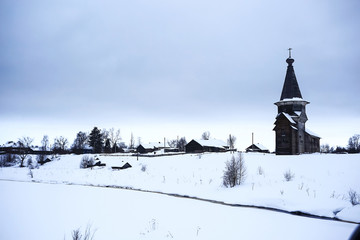 Wooden churches and houses in winter