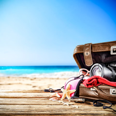 Summer suitcase and beach 