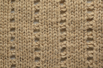 Knit texture of wool knitted fabric with regular pattern as background