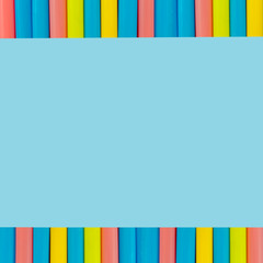 multi  Colorful pipe with copy space for your text on blue background. / education, creativity and feeling happy