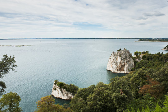 The Gulf of Trieste and the old castle of Duino. Italy.
