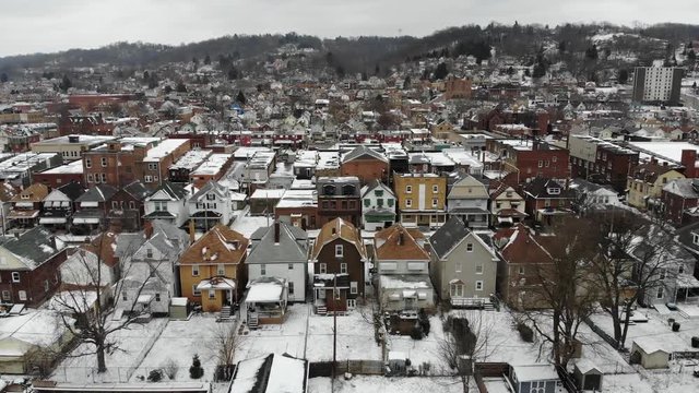 A side profile view of a small northeastern American town in the winter. Pittsburgh suburbs.  	
