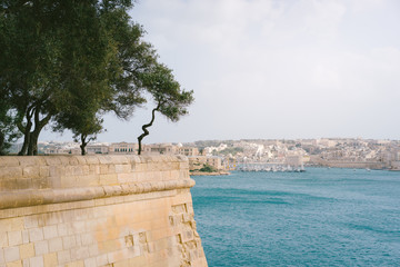 The Grand Harbour view from city walls of Valletta at sunny spring day. Malta Island