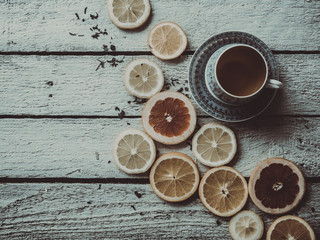 Obraz na płótnie Canvas Cup of tea with citrus
