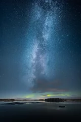Fotobehang Aurora Borealis aka Northern Light boven gedeeltelijk bevroren meer © Jamo Images