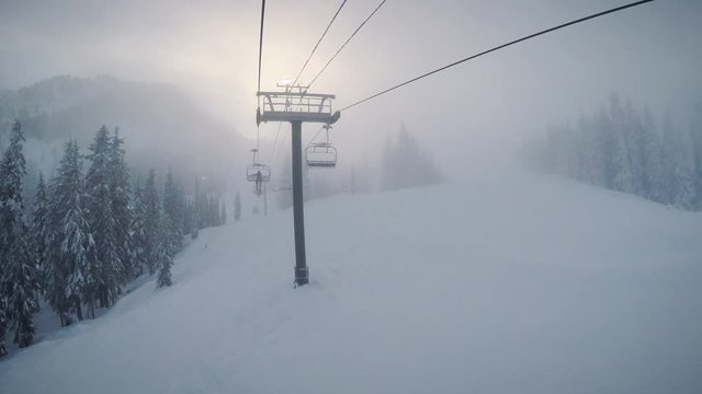 Moody Chairlift Ride in Hazy Winter Fog