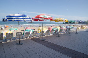 umbrellas and chaise lounges