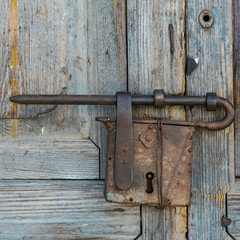 Old padlock on a old dor 