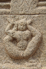 Stone bas-reliefs on the walls the Achyuta Rayas Temple about Courtesan's Street - Sule Bazaar in Hampi, Karnataka, India.