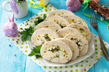 Easter recipe, festive appetizer. Meatloaf with egg, cheese and greens.