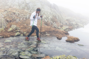 Girl is traveling on a river.