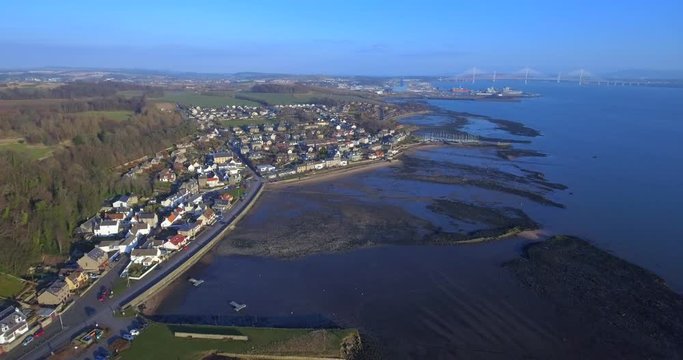 Aerial footage of the village of Limekilns on the north shore of the Firth of Forth in Central Scotland.
