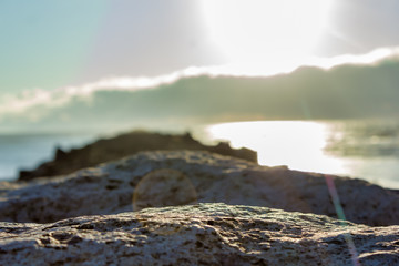 rock sun beach background