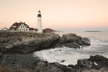 Sun Setting by Portland Lighthouse During Autumn in Maine © alwoodphoto