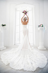 Hairstyle with fresh flowers. rear view close-up. Rustic style