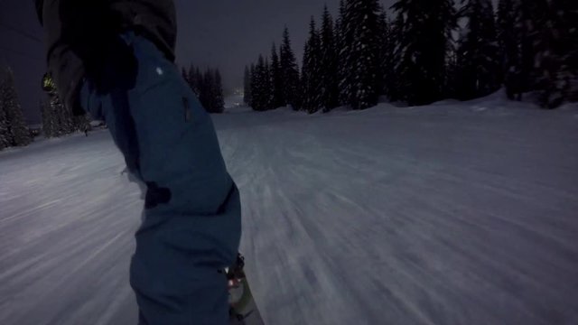 Snowboard Slash POV at Night in Mountain Resort