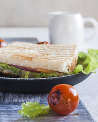 Delicious Breakfast with toast and grilled vegetables. Close up. Vertical.