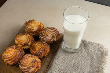 Chocolate cheesecake cupcakes and a glass of milk for Breakfast. Copy spase