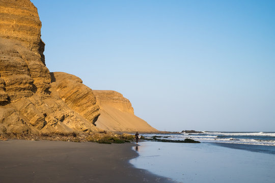 Cliffs by the sea on the coast of Chicama, Peru