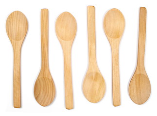 set empty wooden spoons isolated on white background