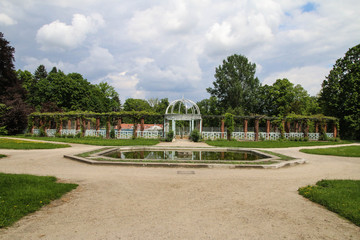 architecture in a garden, fountain and park pathways