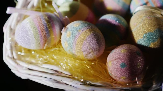 Basket with decorative Easter eggs. Preparing for Easter