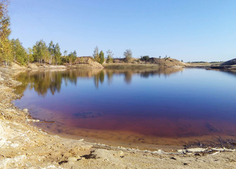 Obraz premium The dirty lake is in the quarry area