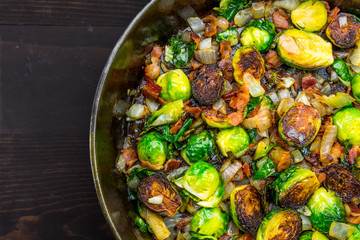 Cast Iron Skillet with Brussels Sprouts with sliver of table
