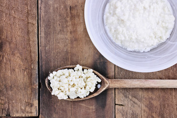 Fresh Kefir grains and whey. Kefir is one of the top health foods available providing powerful probiotics. It is cultures of yeast and bacteria use to make a fermented milk product.