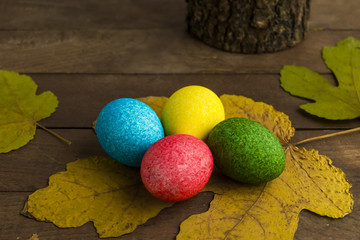 Colorful painted Easter Eggs on the wooden table.Close up taken,isolated.