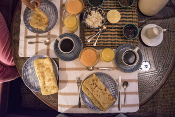 Breakfast Layout with Pancakes, Coffee and OJ